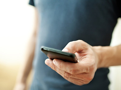 Man Holding Cellphone